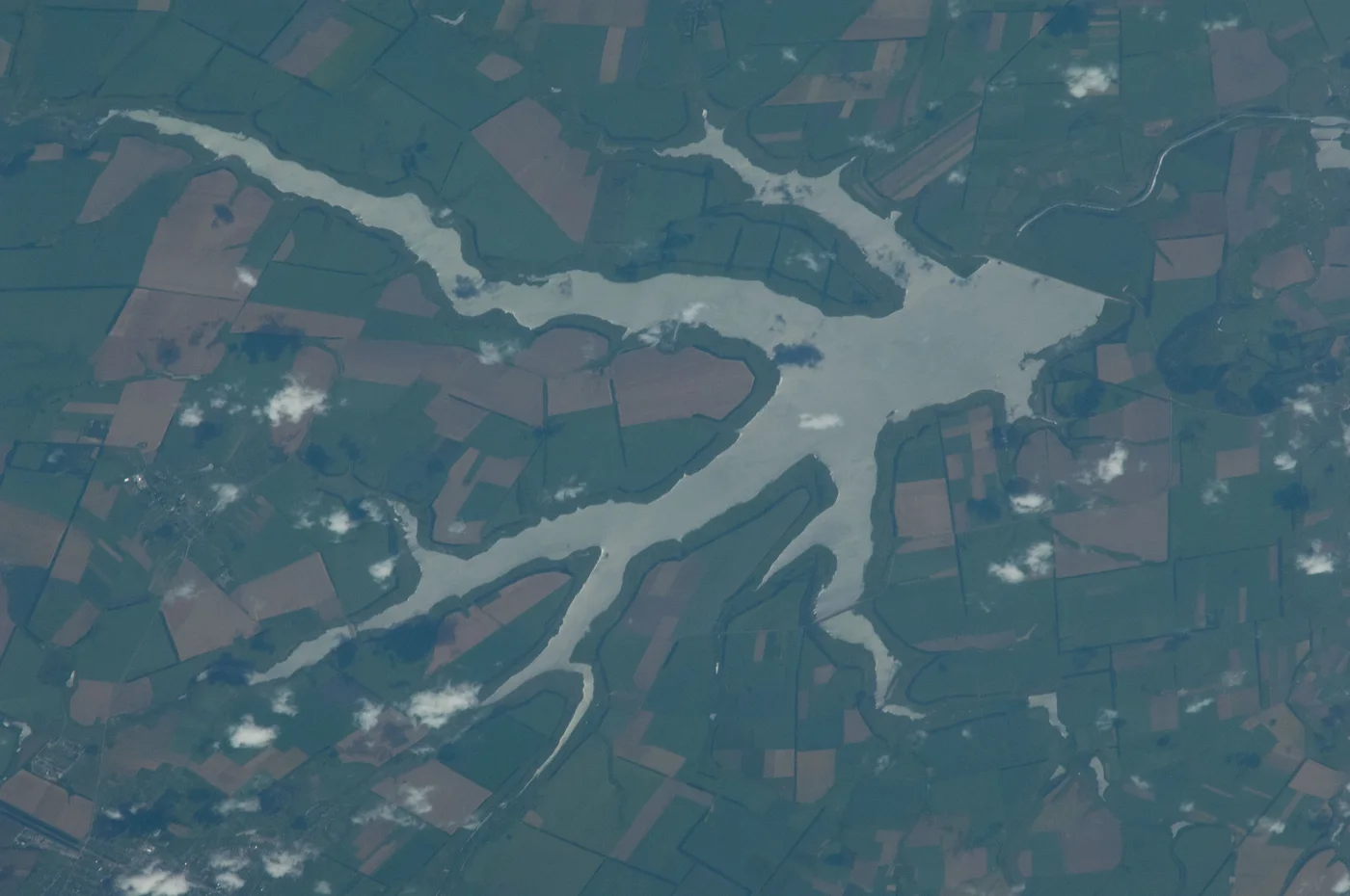 Satellite view of a river winding through farmland