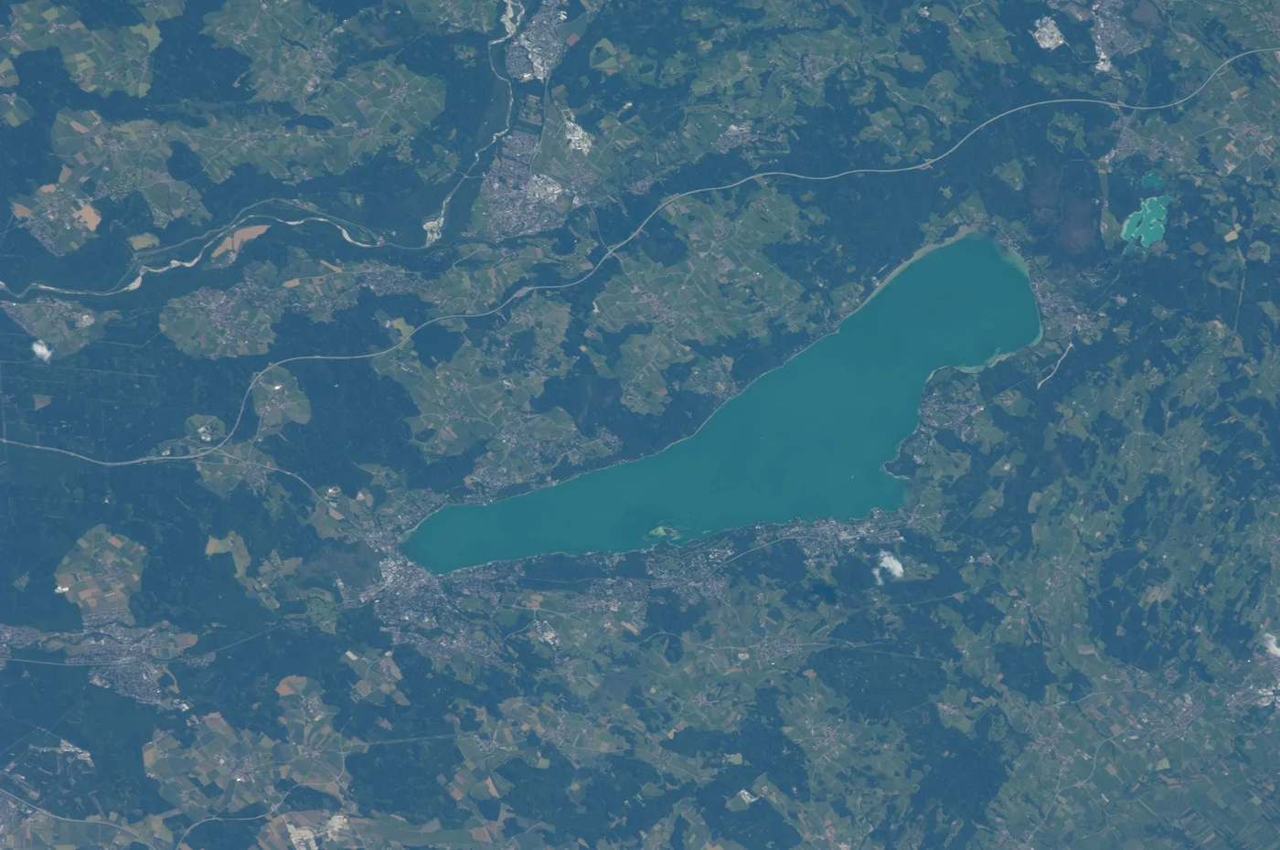 Satellite view of a lake and surrounding landscape